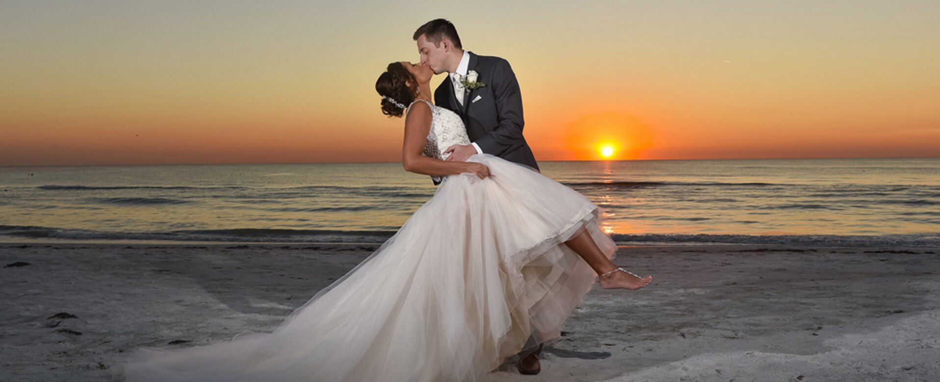 bride and groom on beach