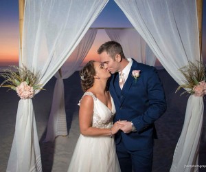 bride and groom at altar